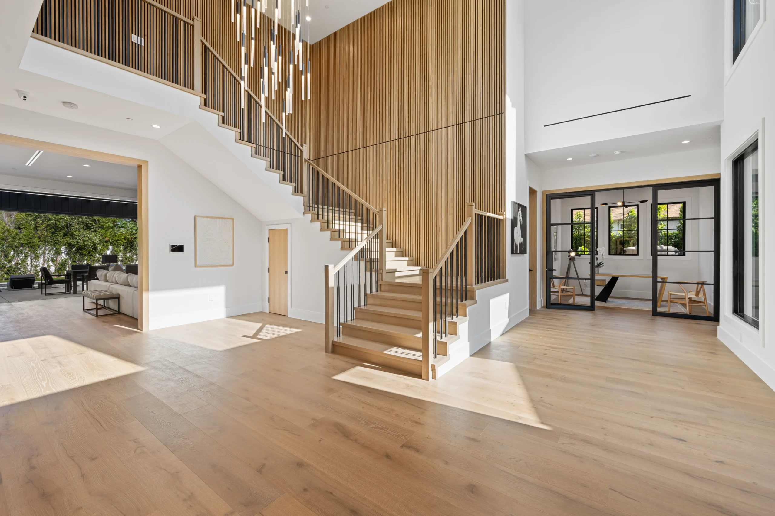 Interior renovation of a luxury home featuring upgraded living spaces, custom finishes, and sophisticated design