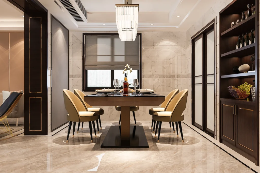 Elegant dining area with marble walls and chandelier