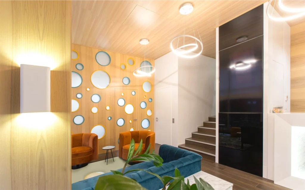 Bright minimalist living room with fireplace and large windows