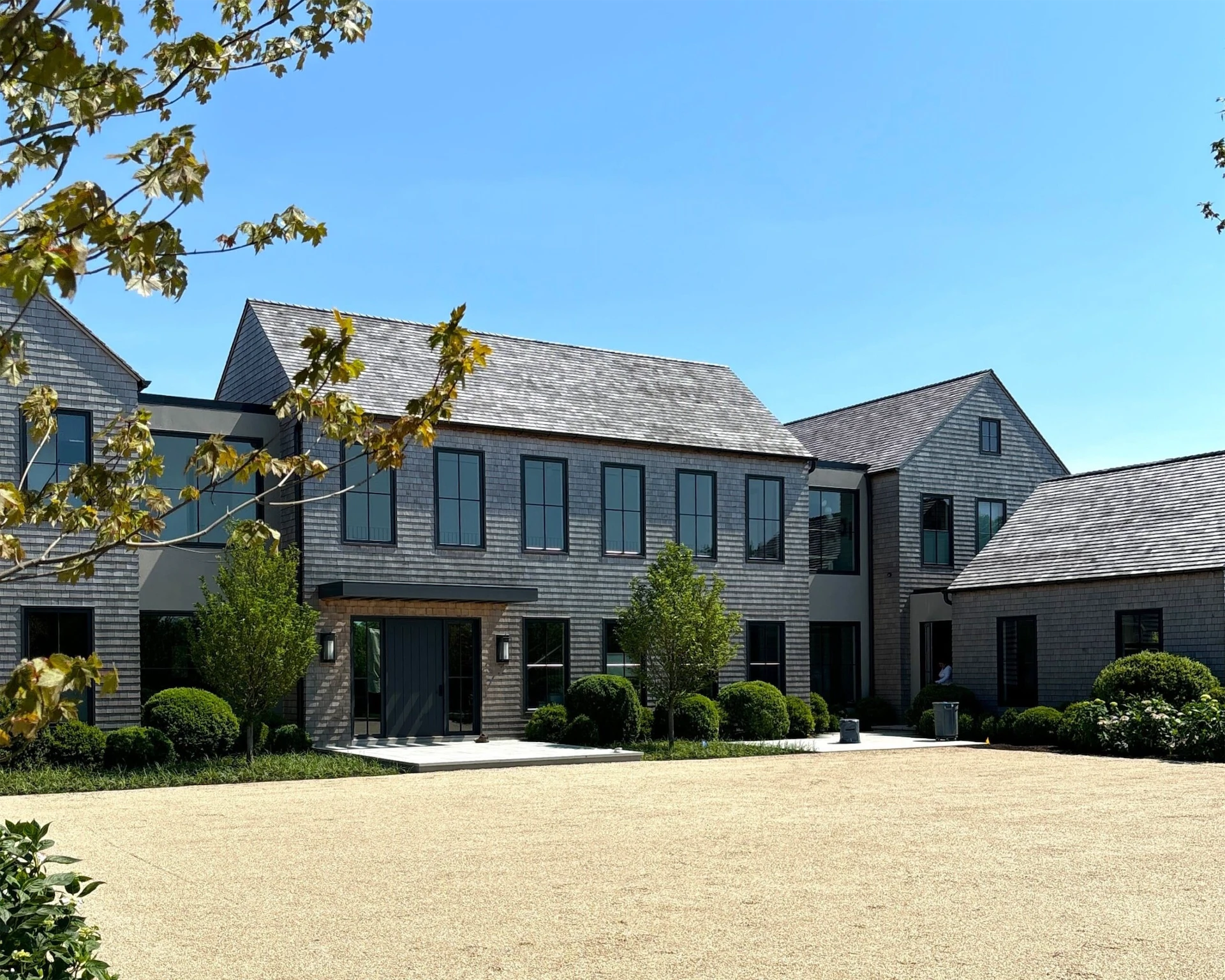 Luxury custom home exterior with modern shingle facade