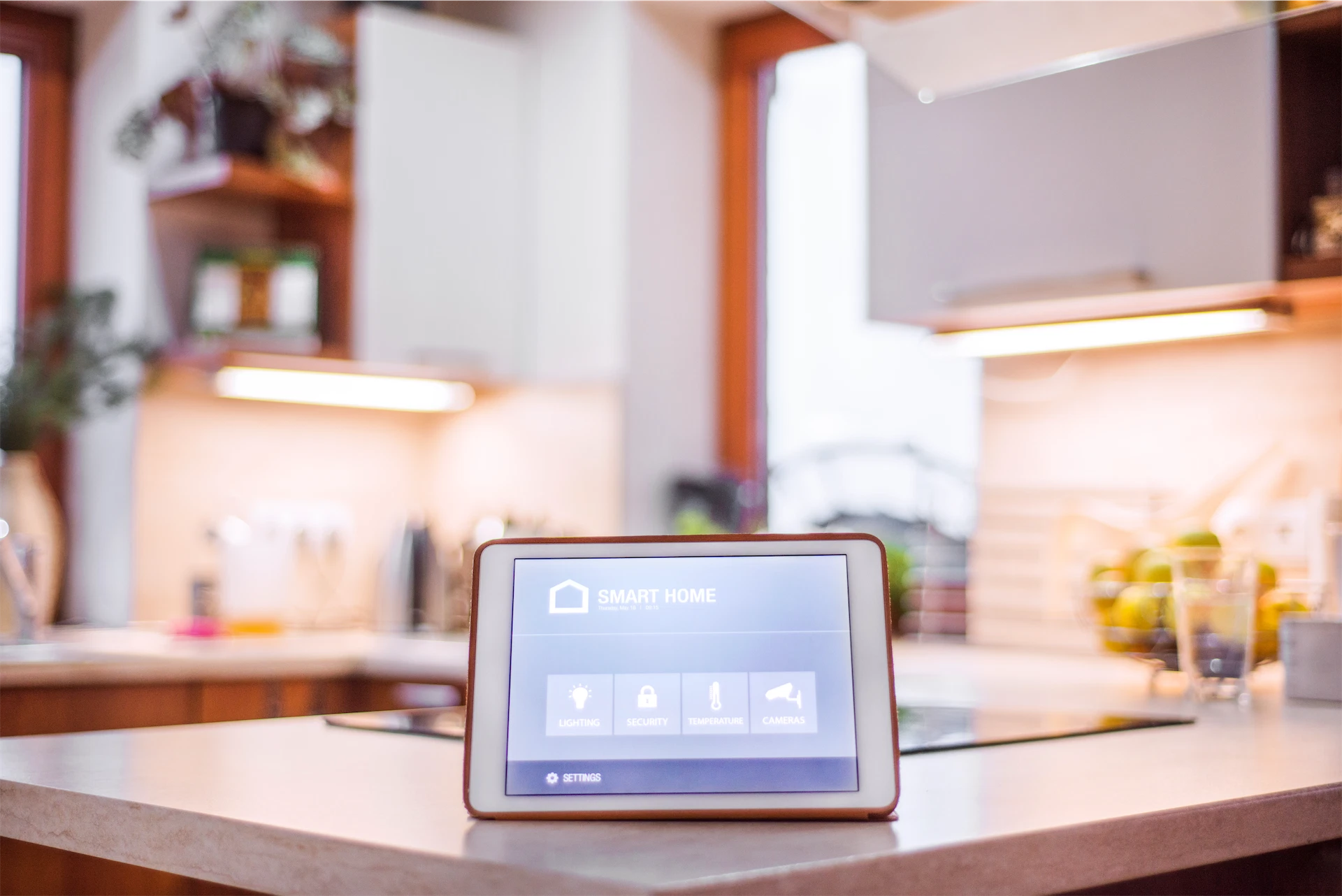 Smart home tablet controlling lighting and security system
