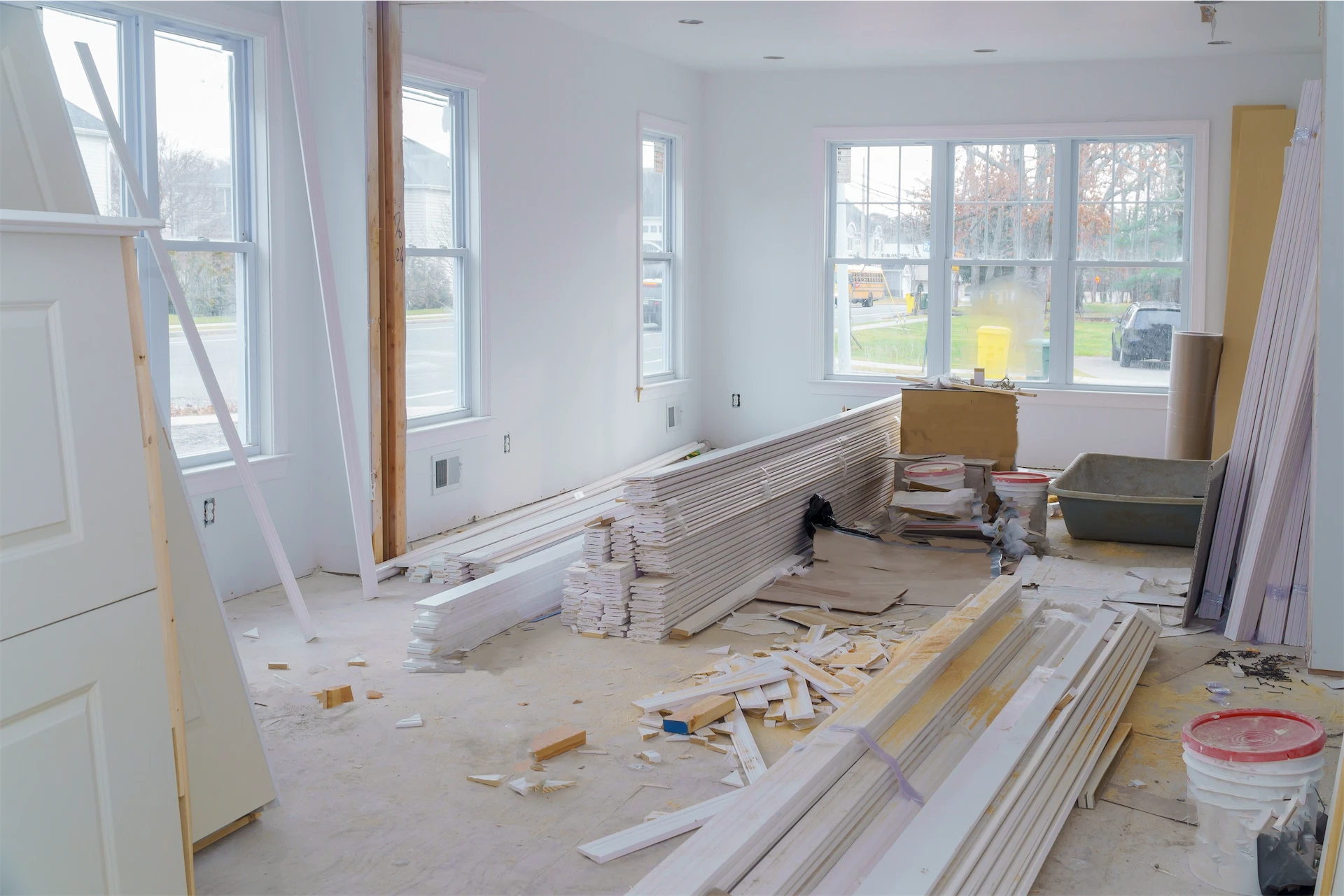Interior home renovation with drywall and trim materials inside