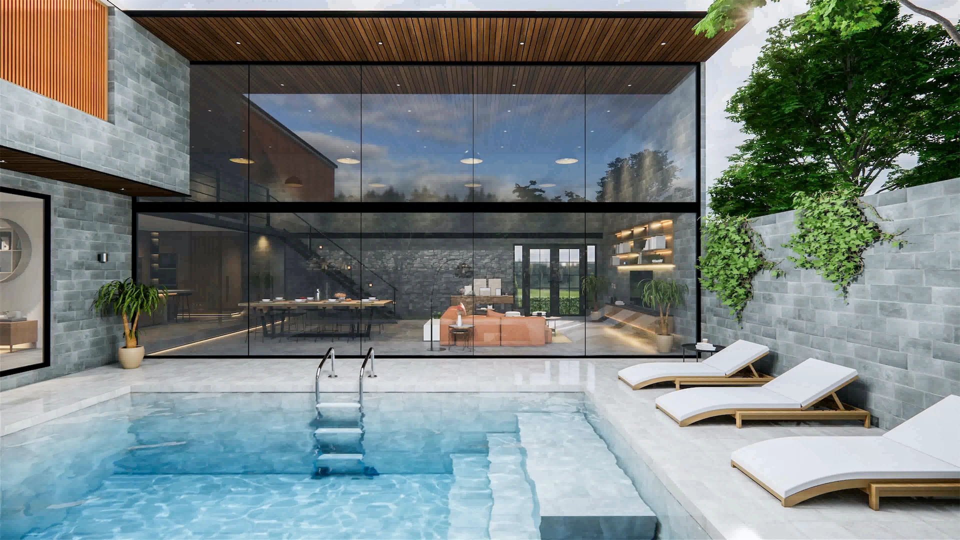 Contemporary luxury home with floor-to-ceiling glass walls, a private swimming pool, and outdoor living space by a custom home builder