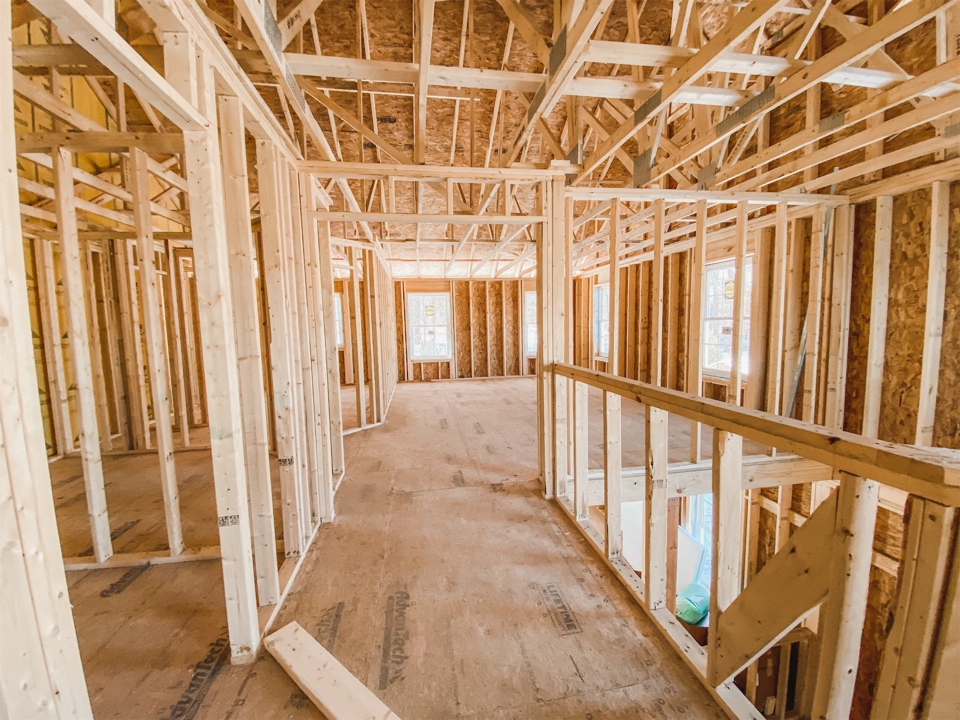 Interior wood framing for home second story additions, showing the structural layout of a new residential living space